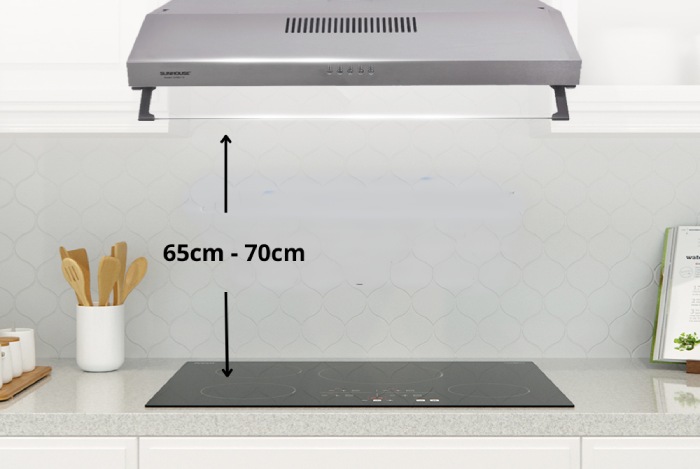 Khoảng cách từ máy hút mùi âm tủ đến bếp nấu cần dao động từ 65 - 70cm
